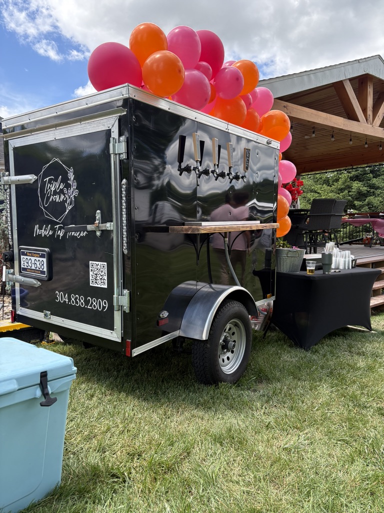 Our tap trailer serving both beer and custom cocktails.